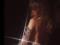 Сексуальная Памела Андерсон в кружевном наряде засветила обнаженную грудь