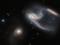 «Хаббл» сделал снимок галактик, напоминающих космический корабль из «Звездного пути»