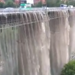 Ливень превратил мост в Каменец-Подольском в огромный водопад: впечатляющее видео