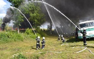Під Києвом горить склад деревини