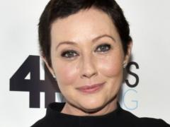 Shannen Doherty in a long wig started shooting after two years of fighting cancer