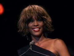 Whitney Houston met with a woman?
