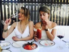 After the break with the Mask, Hurd relaxes in Bali with her friend