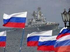 Near the borders of Latvia, three Russian warships are seen