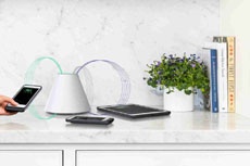 Presented is a device that charges any smartphone  through the air 