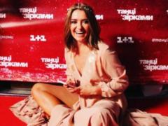 Lose weight Mogilev put on a coat on the naked body in a new photo shoot