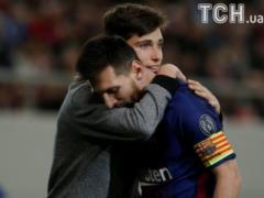 The fan ran out onto the field and ground Messi during the Champions League match