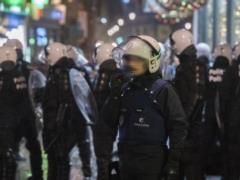 The rabid crowd began to smash Brussels