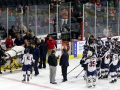 The head coach of the hockey team had a heart attack right during the fight