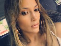 Jennifer Lopez in a tight dress bragged thin waist