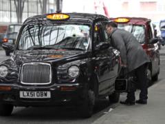 The famous black London cab becomes  green 