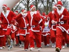 In Madrid, thousands of people in the Santa Claus costumes ran through the streets of the city