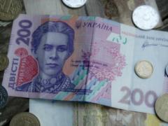 Долги Киева распишут по украинцам