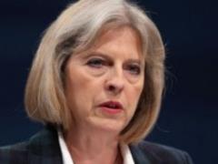 May accused Putin of using information as a weapon