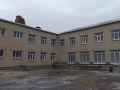Обстрелянное  градами  Новолуганское возвращается к жизни