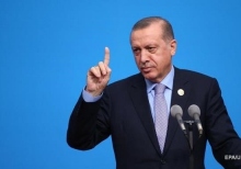 The guards attacked the man who was trying to embrace Erdogan