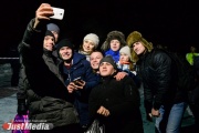 Phone is more important than towels. Baptism as an excuse to lay out another photo in the social network
