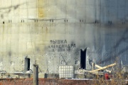 At the base of the unfinished tower sawed holes for explosives. A PHOTO,