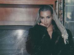 Four-year-old daughter Kim Kardashian photographed mother naked