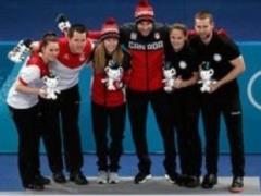 Первыми олимпийскими чемпионами по керлингу в даблмиксте стали канадцы