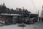 In a frontal collision of a wagon and a bus, 6 people were killed