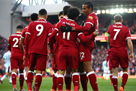 Liverpool home defeated West Ham and climbed to second place