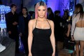 Kim Kardashian showed an unusually laconic image at a party in Hollywood