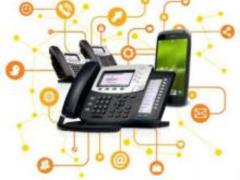 Why do many companies switch to IP PBXs