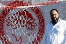 The owner of Olympiakos and Nottingham Forest is accused of drug trafficking