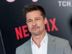 Lonely Brad Pitt got carried away by a curly brunette - media