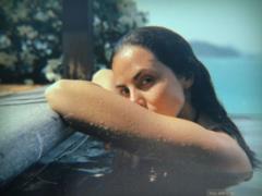 Kamensky in a swimsuit erotically emerged from under the water, demonstrating the charms of the body