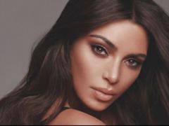 Family idyll: Kardashian shared a rare photo with three children and her husband