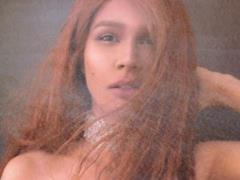 Zianja remembered Asian roots and showed herself as a boy in her childhood