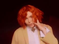 Irina Bilyk with short red hair released a clip with lesbian kisses