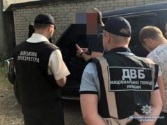 В Днепре работники Нацполиции задержали полицейского за вымогательство четырех тысяч долларов США