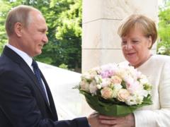German journalists told about the insult that Putin inflicted on the German Chancellor