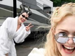 Smiling Angelina Jolie with horns on her head podderkalas on the set of  Maleficent 2 