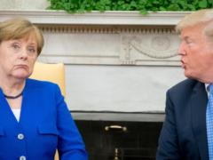 Одинокая Меркель пытается устоять перед Трампом