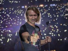 Oleg Vinnik in the pouring rain gave the biggest concert in his career