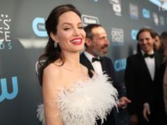 At the attractions with the children: Jolie celebrated 43 birthday in the amusement park