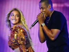 The liberated Beyonce shone her naked buttocks on the bed next to her husband