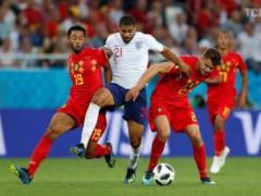 Belgium squad defeated England and won the group, both will play in the World Championship playoffs