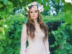 Oksana Marchenko boasted a lush decollete in a swimsuit