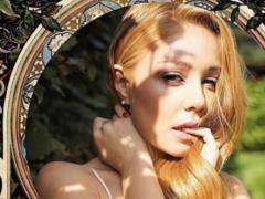 Feminine Tina Karol shone with slender legs in designer outfits