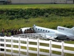 In the US, the plane broke in half, there are dead