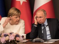 Пальто Путина впечатлило Меркель