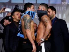 Usyk came to weighing with Beleu in a scarf  Manchester City 