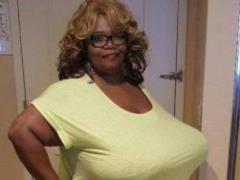 How does a woman live with an abnormally large breasts