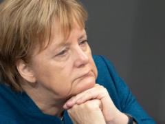 Merkel gave a fiery speech before a quick departure