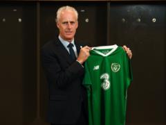 The national team of Ireland was headed by the coach, who led them to the 2002 World Cup